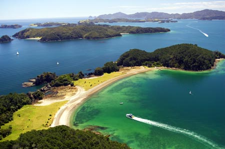 Motuarohia (Roberton) Island, Bay of Islands, Northland, North Island, New Zealand - aerial  