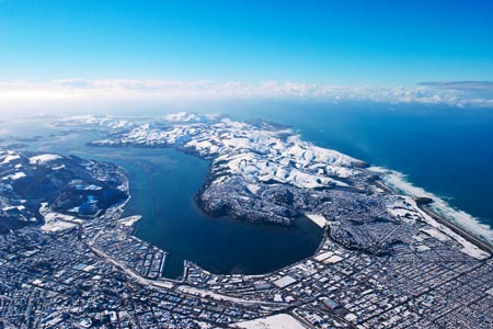 Dunedin and snow, South Island, New Zealand - aerial 
