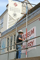 Sign Writer at the Fleur de Lis