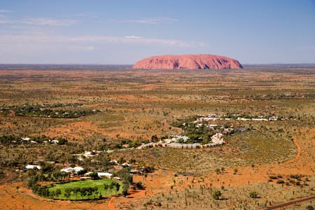 Yulara Village and Uluru / Ayers Rock, Uluru - Kata Tjuta National Park, World Heritage Area, Northern Territory, Australia - aerial 