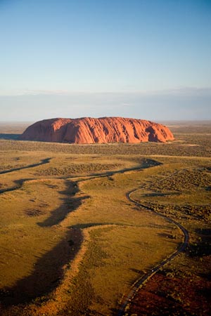 Late Afternoon Light on Uluru / Ayers Rock, Uluru - Kata Tjuta National Park, World Heritage Area, Northern Territory, Australia - aerial