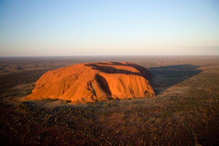 Late Afternoon Light on Uluru / Ayers Rock, Uluru - Kata Tjuta National Park, World Heritage Area, Northern Territory, Australia - aerial 