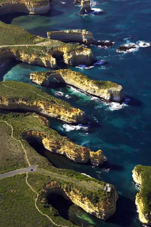 Loch Ard Gorge and The Island Archway, Port Campbell National Park, Great Ocean Road, Victoria, Australia - aerial AVcG057