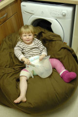 Time has been put on hold, poor baby girl.  That goes all the way to her chest!