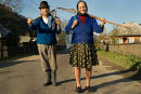 Three peasant women at the market, Dragomiresti, Maramures, Romania