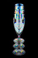 Three champagne flutes.