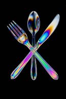 Crossed knife, fork and spoon.