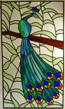 Stained glass peacock panel by Debbie Barker.