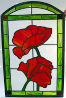 Stained glass 'flower' fire screen by Gillian Ashbury.