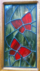 Stained glass panel by Shirley Adams.