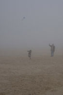 Only a Grandad could keep a promise to fly a kite when the weather is as bad as this